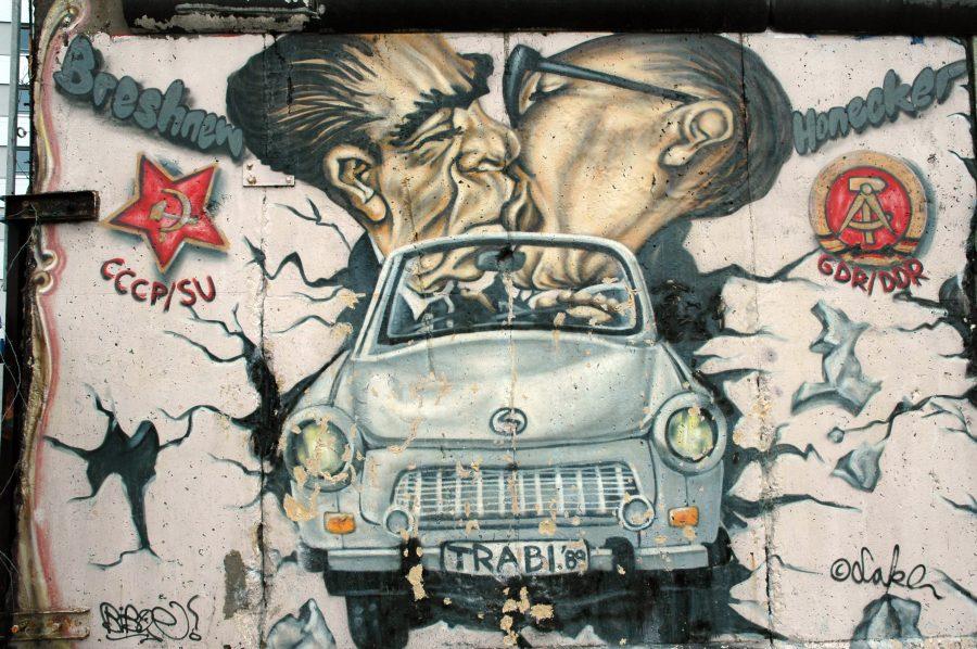 Local artist photographs art on Berlin Wall