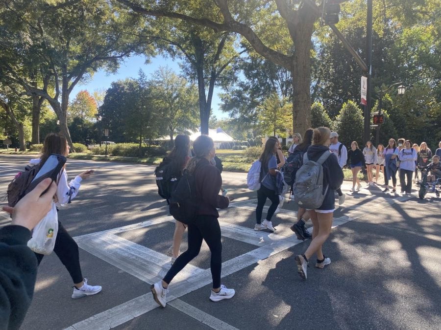 Students cross University Boulevard on November 10, 2021.