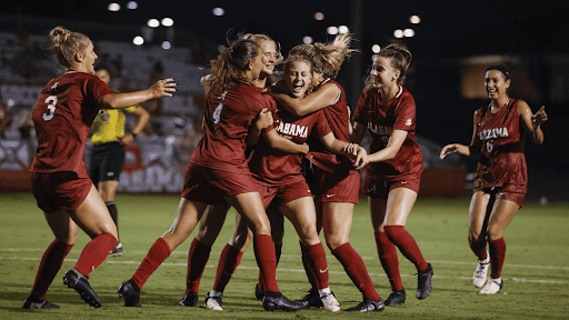 Alabama womens soccer celebrates after scoring a goal. 