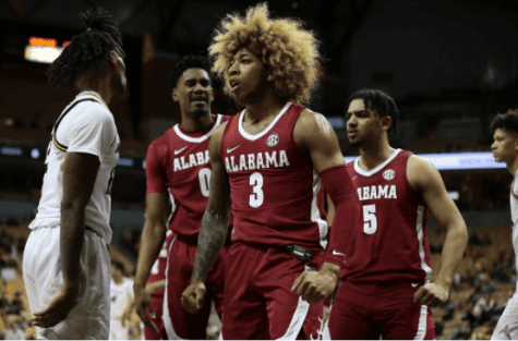Alabama guards JD Davison (3) and Jaden Shackelford (5) and forward Noah Gurley (0) show excitement after a play in Alabama’s 92-86 loss to Missouri on Jan. 8, 2022