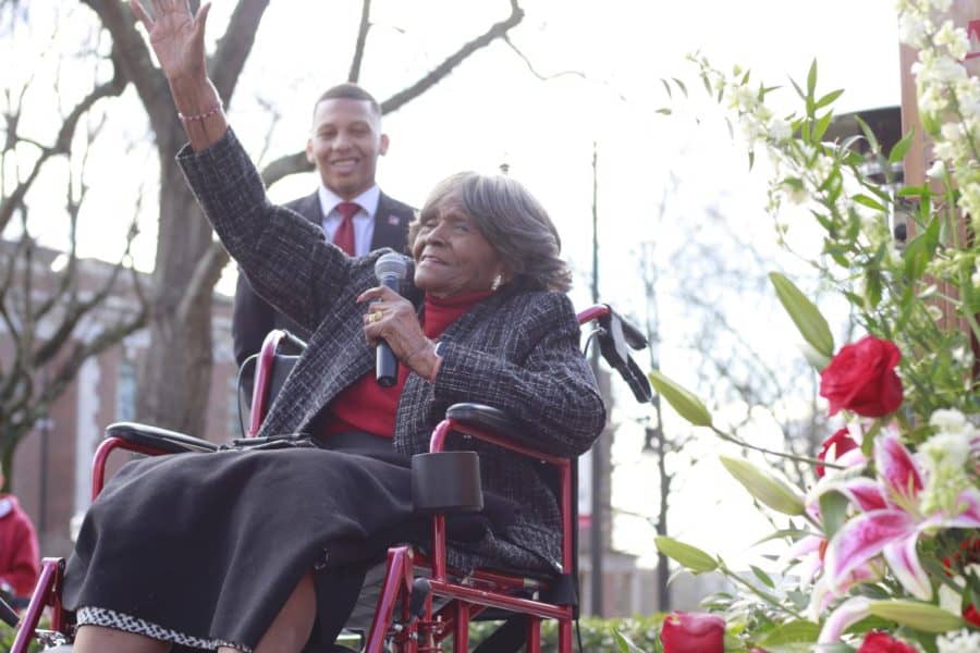 Autherine Lucy waves to the crowd at the dedication of the newly named Autherine Lucy Hall in Tuscaloosa, Alabama on Feb. 25, 2022. 