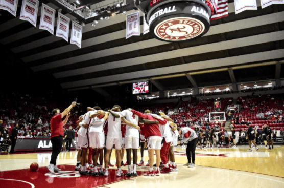 Alabama takes part in a huddle prior to taking on the Mississippi State Bulldogs at Coleman Coliseum on Feb. 16, 2022. 