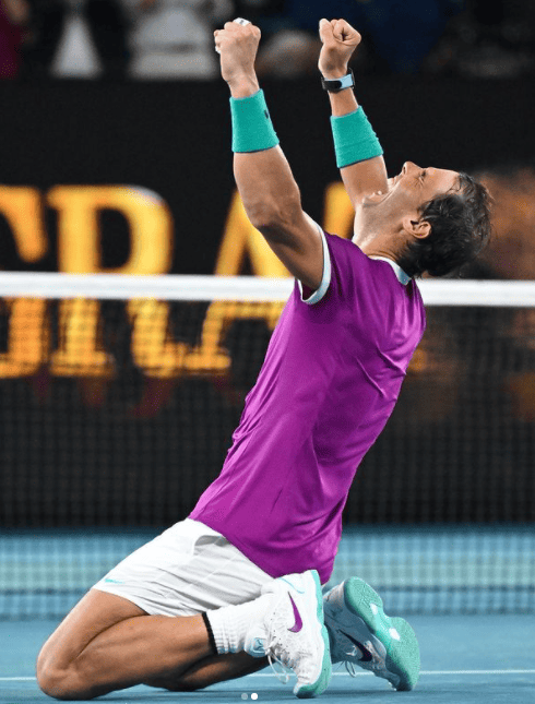 Spanish tennis player Rafael Nadal celebrates after his 5-set win over Russian tennis player Daniil Medvedev on Jan. 30, 2022. 