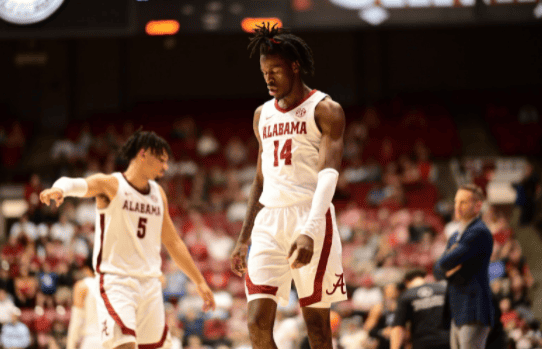 Alabama guards Keon Ellis (14) and Jaden Shackelford show disappointment in the Crimson Tide’s 87-71 loss to the Texas A&M Aggies on March 2 at Coleman Coliseum in Tuscaloosa.