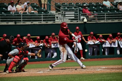 Alabama right fielder Andrew Pinckney (21) swings at a pitch in the Crimson Tide’s 3-0 win over the No. 14 Georgia Bulldogs on April 24 at Sewell-Thomas Stadium in Tuscaloosa, Alabama.