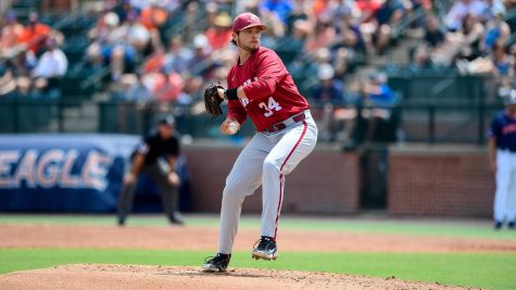 Alabama starting pitcher Jacob McNairy (34) prepares to throw a pitch in the Crimson Tide’s 6-4 loss to the No. 20 Auburn Tigers on May 14 at Plainsman Park in Auburn, Alabama.