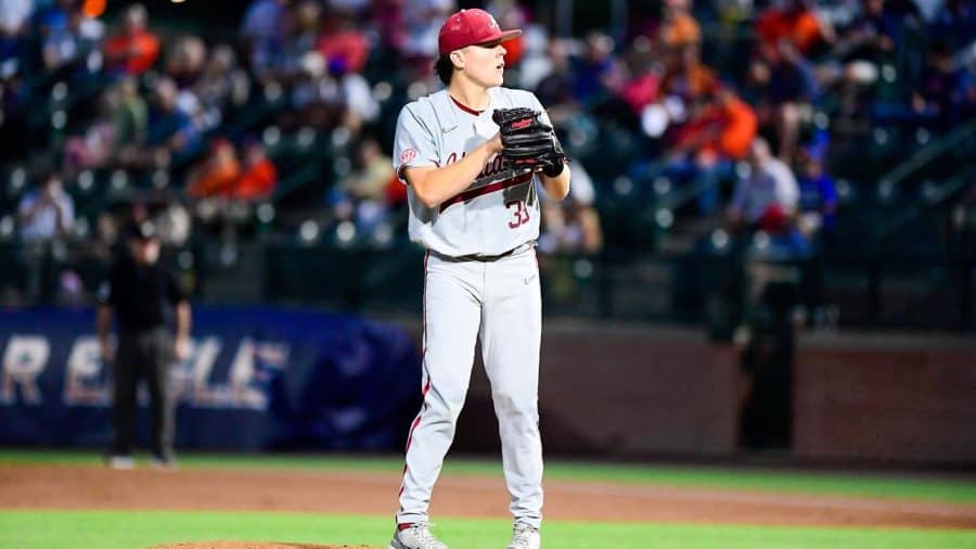 Alabama starting pitcher Garrett McMillan (39) prepares to throw a pitch in the Crimson Tide's 3-2 loss to the No. 20 Auburn Tigers on May 13 at Plainsman Park in Auburn, Alabama.