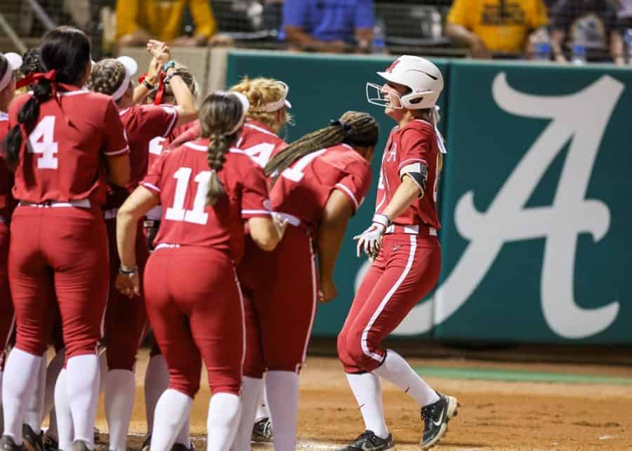 Alabama left fielder Jenna Johnson (88) crosses the plate after hitting a home run in the Crimson Tides 6-2 victory over the Chattanooga Mocs on May 21 at Rhoads Stadium in Tuscaloosa, Alabama.