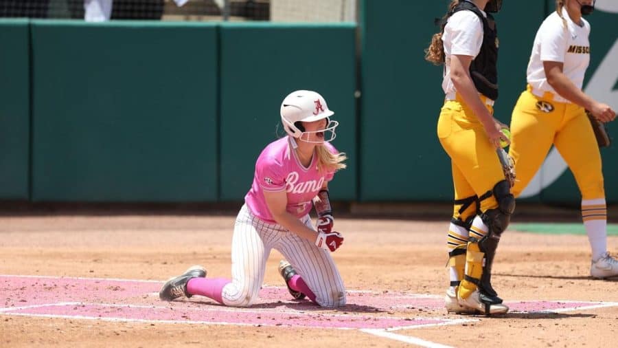 Alabama catcher Ally Shipman (34) celebrates after sliding into home plate in the Crimson Tide’s 3-1 victory over the No. 23 Missouri Tigers on May 7 at Rhoads Stadium in Tuscaloosa, Alabama.