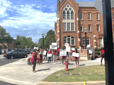 Students protest monument’s use of bricks made by slaves